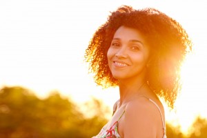 woman-with-sun-in-background